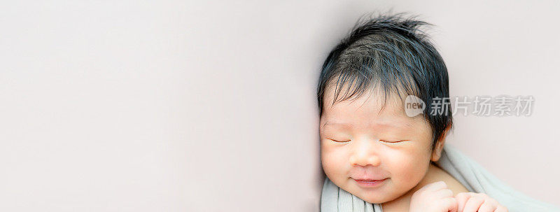 Asian newborn baby sleeping